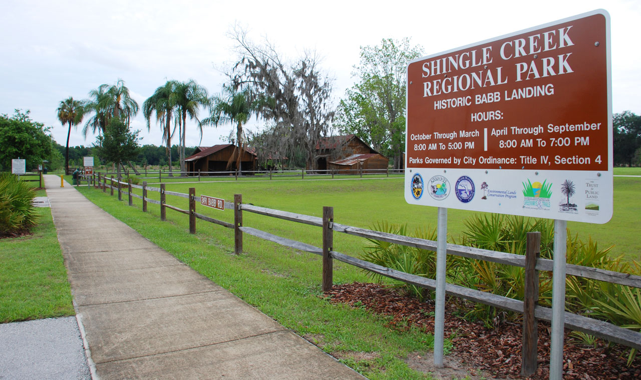 Shingle Creek Nature Reserve, entrance with sign showing open hours