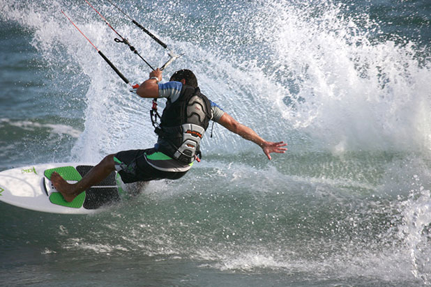 Kitesurfing in Estepona, a great all over workout for your core and upper body - photo courtesy of www.kitesurfestepona.com