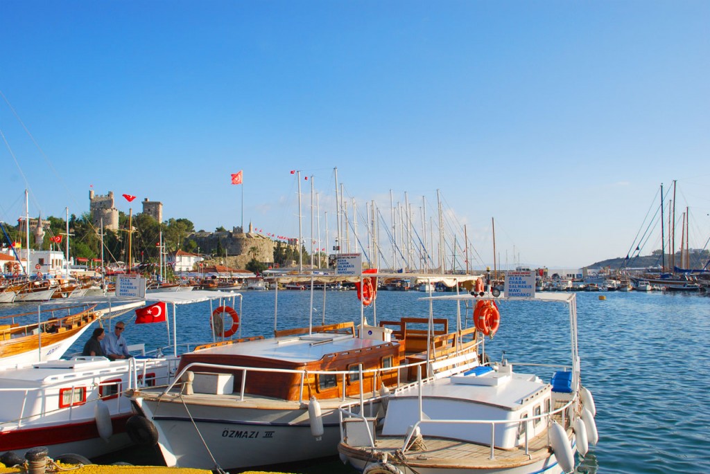 The historic Bodrum castle surrounded by many large yachts