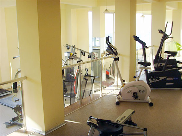 Upper level in the gym with rowers, bikes and cross trainers