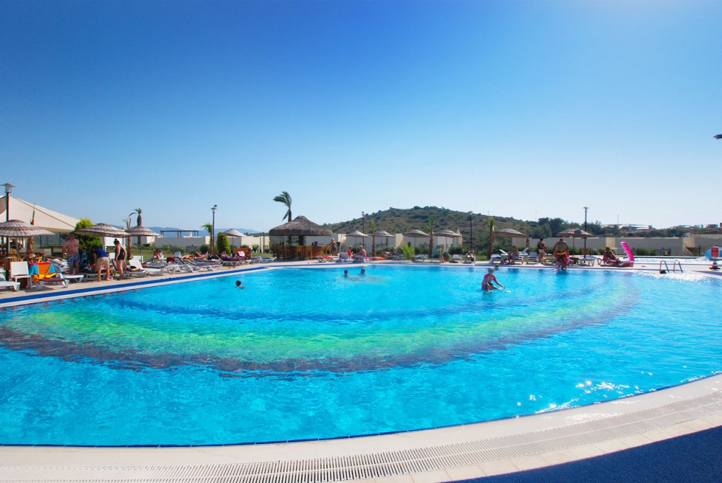 The main pool has plenty of space for sun loungers and parasols to relax near the poolside