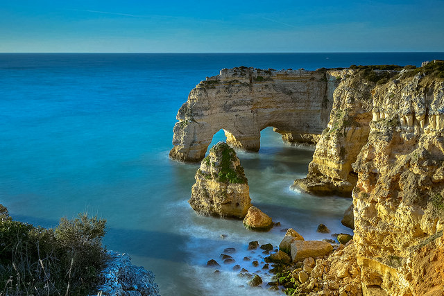 Algarve beach with impressive rocky arches and cliffs - photo courtesy Luis Ascenso Photography