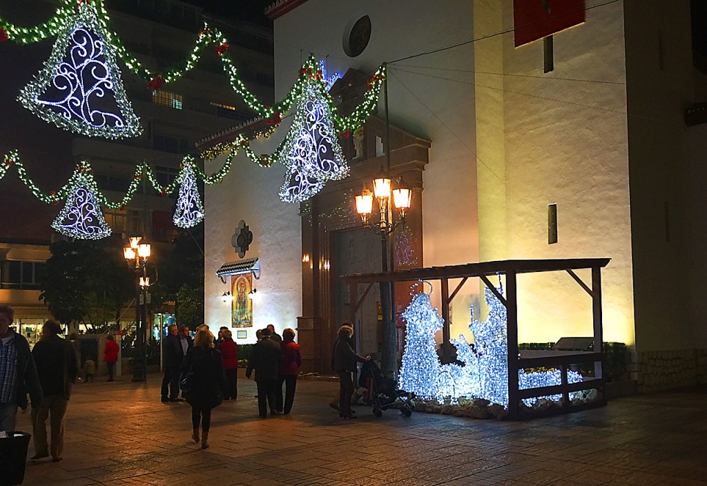 The Plaza de la Constitucion in Fuengirola, showing the illuminated lights and nativity scene